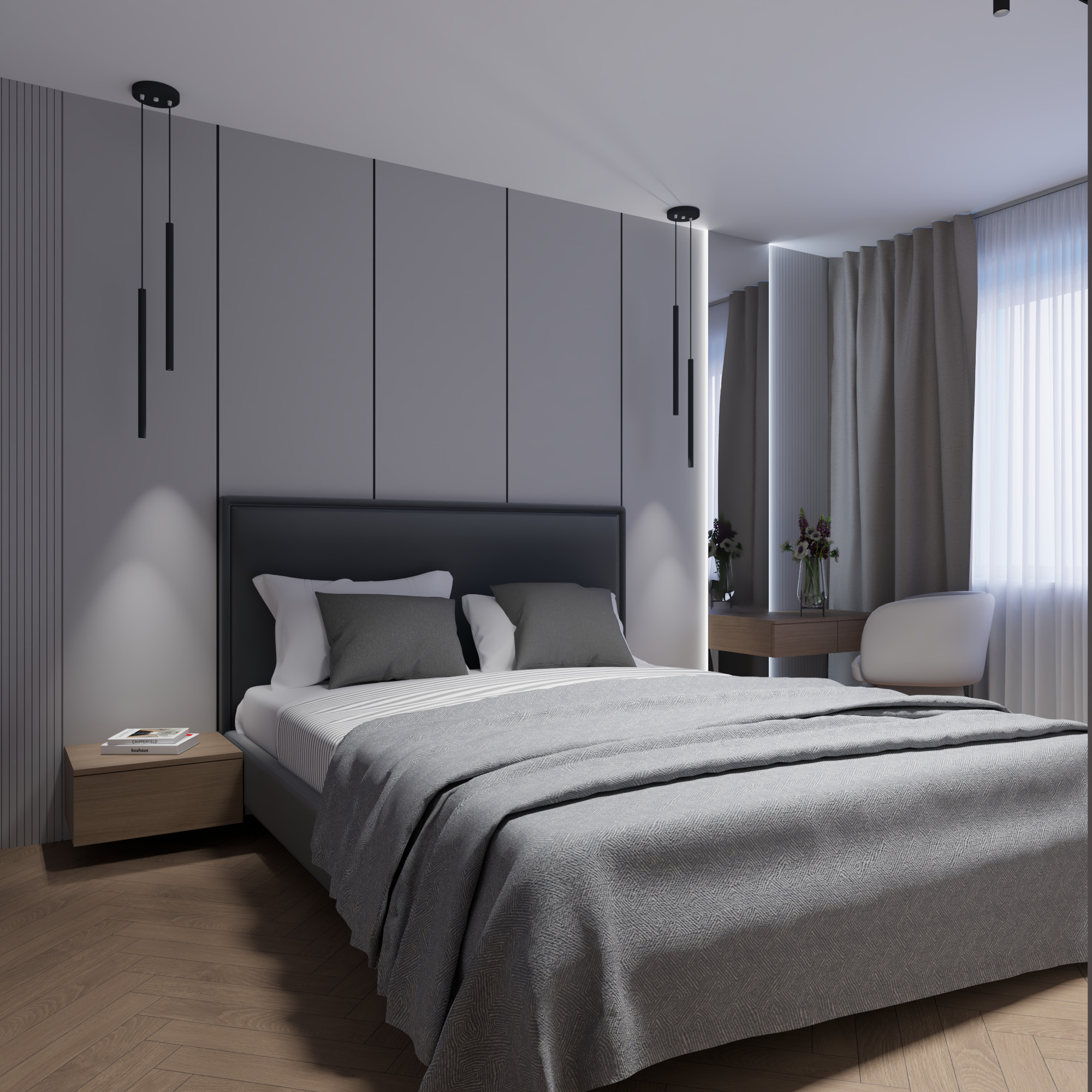 Nowoczesna sypialnia w odcieniach szarości z drewnianą podłogą w jodełkę. Minimalistyczne lampy wiszące, łóżko z szarym zagłówkiem i tekstyliami, toaletka z kwiatami.