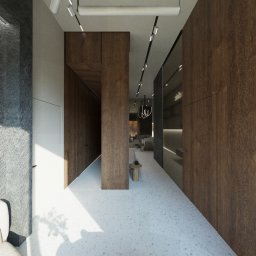 Latre Design - Wizualizacja nowoczesnego biura z drewnianymi panelami, białym lastryko i minimalistycznym oświetleniem, widok na dalszą część przestrzeni biurowej z krzesłem obrotowym i lampą wiszącą.