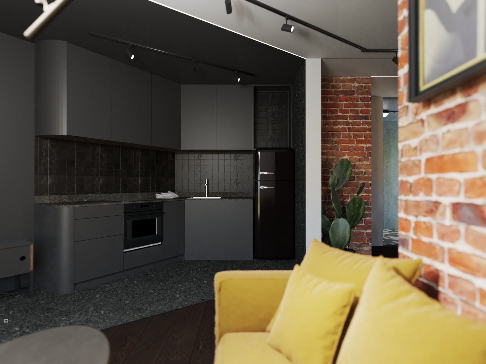 Nowoczesna kuchnia w odcieniach szarości z czarną lodówką i płytkami, oświetlenie punktowe, ceglana ściana w tle, żółta sofa na pierwszym planie.
