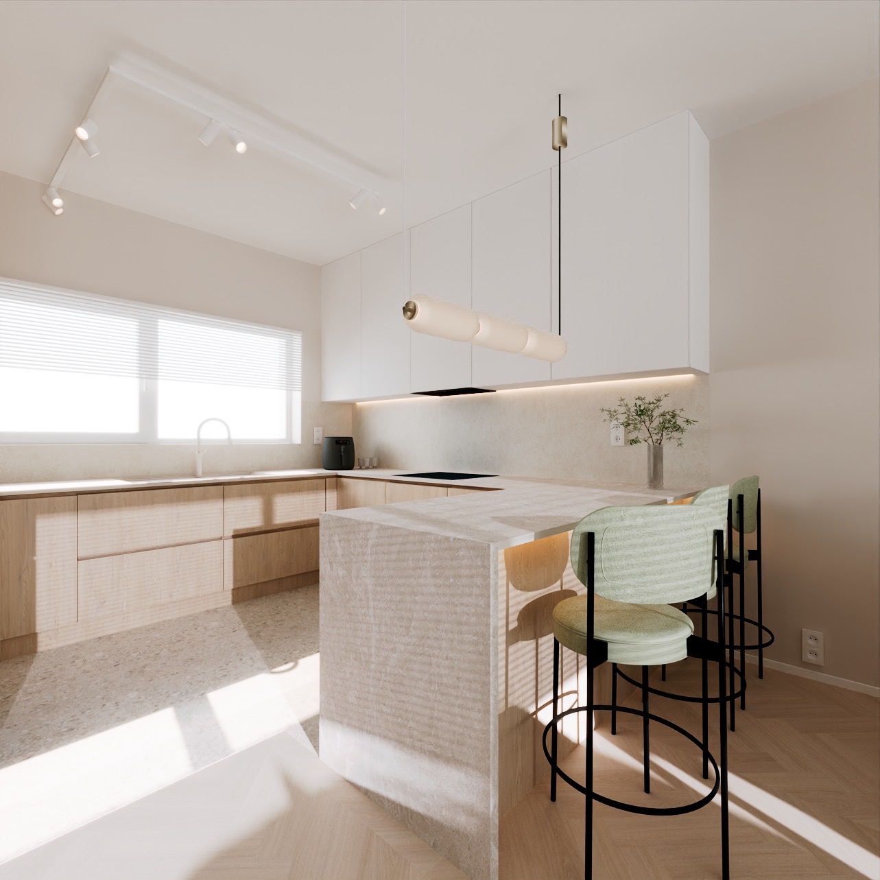 Jasna kuchnia z drewnianymi frontami, wyspą z blatem z szarego kamienia, nowoczesnym oświetleniem i zielonymi krzesłami barowymi na czarnych nogach.