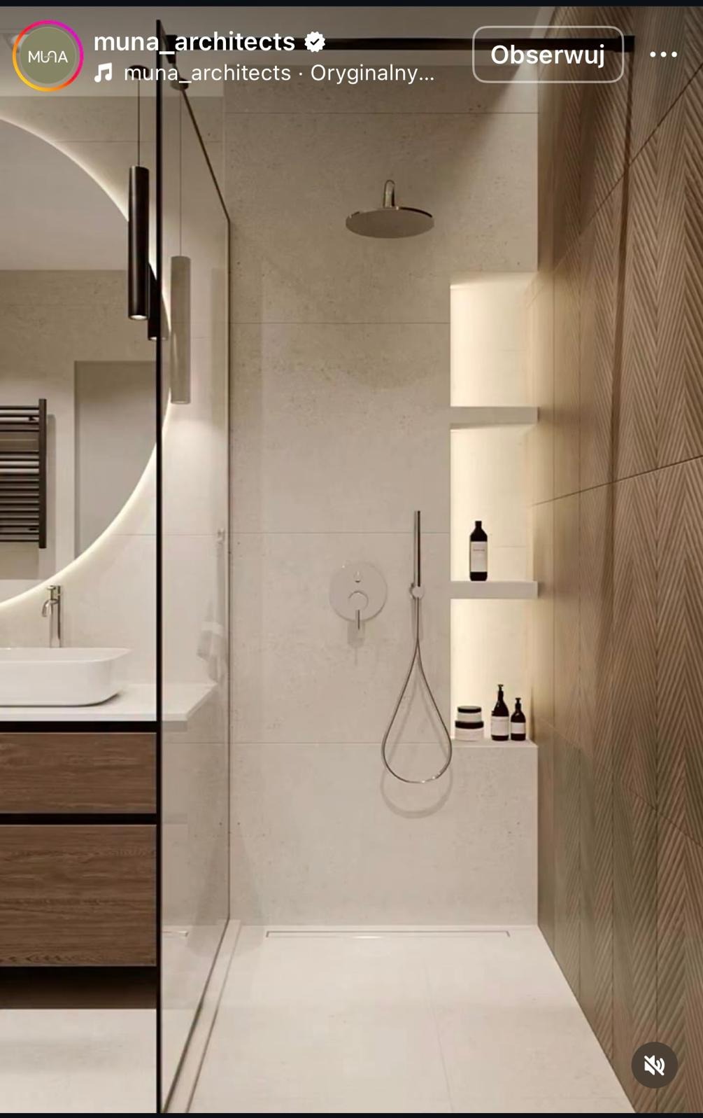 Nowoczesna łazienka z kabiną typu walk-in, umywalką na szafce z drewnianymi frontami i oświetleniem LED. Minimalistyczny design z akcentem na naturalne materiały.