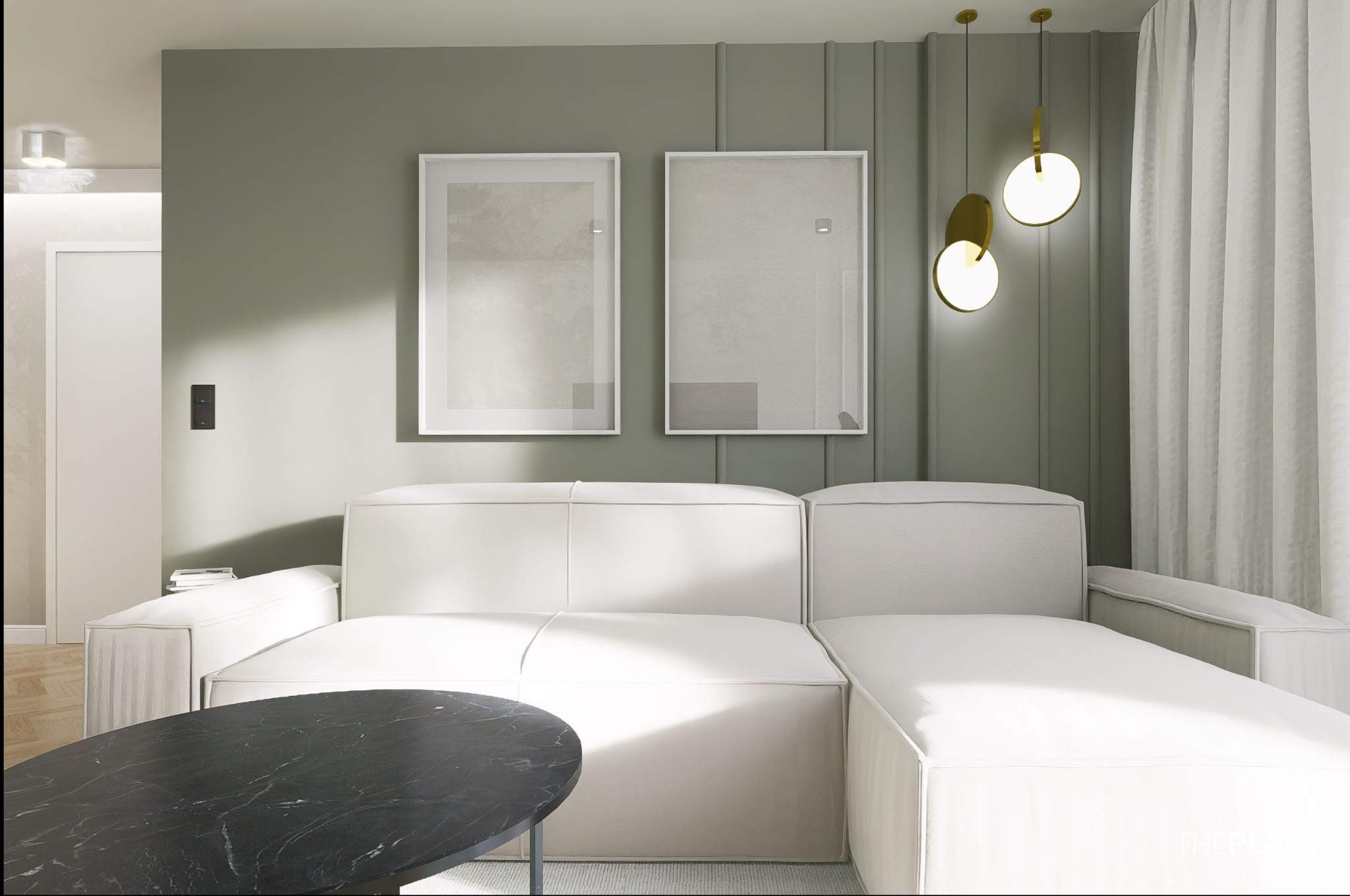 Minimalistyczny salon z białym narożnikiem, okrągłym stolikiem z czarnego marmuru i abstrakcyjnymi obrazami w białych ramach na oliwkowozielonej ścianie.