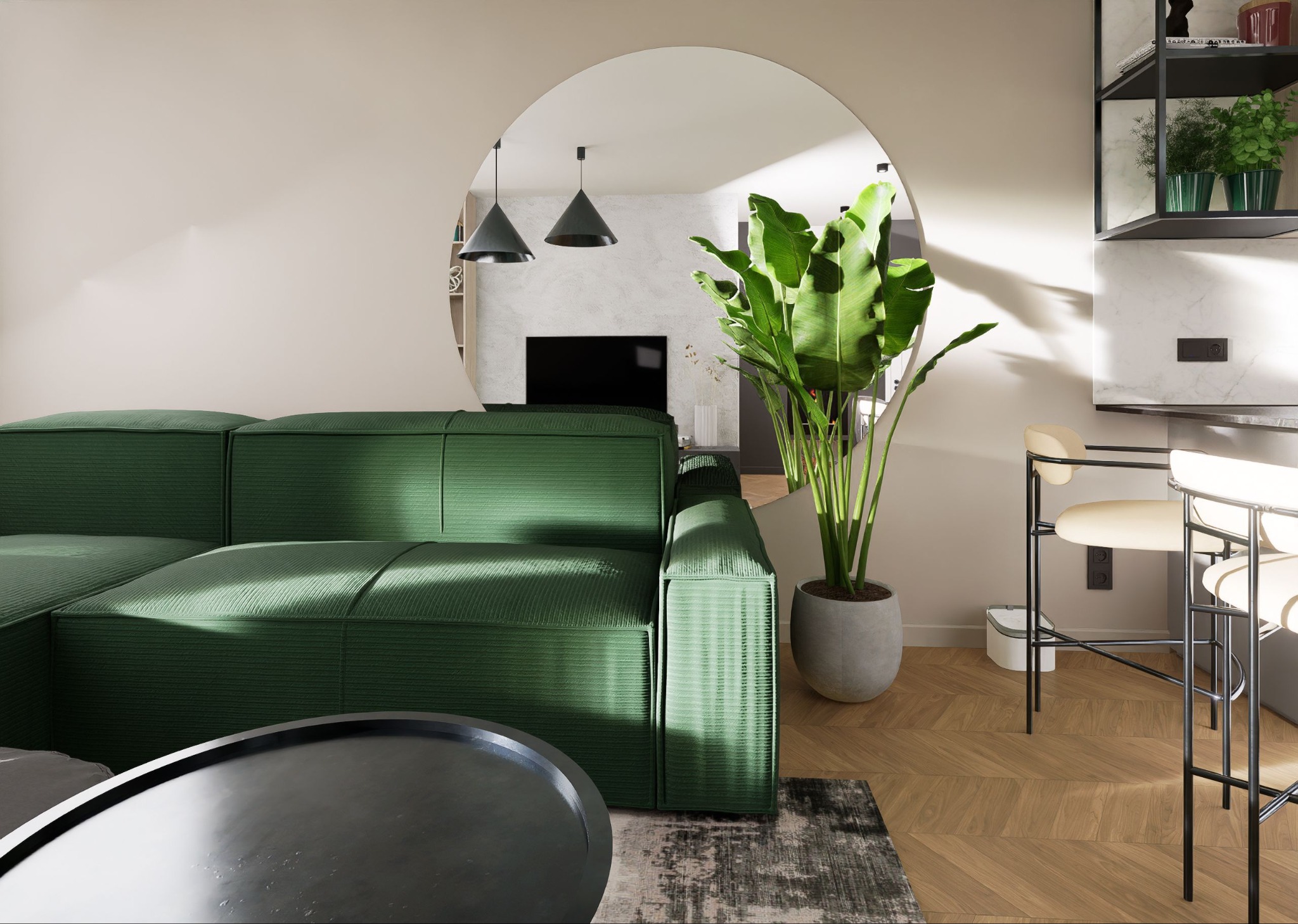 Nowoczesny salon z zieloną sofą modułową, okrągłym lustrem odbijającym wnętrze i rośliną w donicy. Parkiet w jodełkę i minimalistyczne krzesła barowe dopełniają aranżacji.