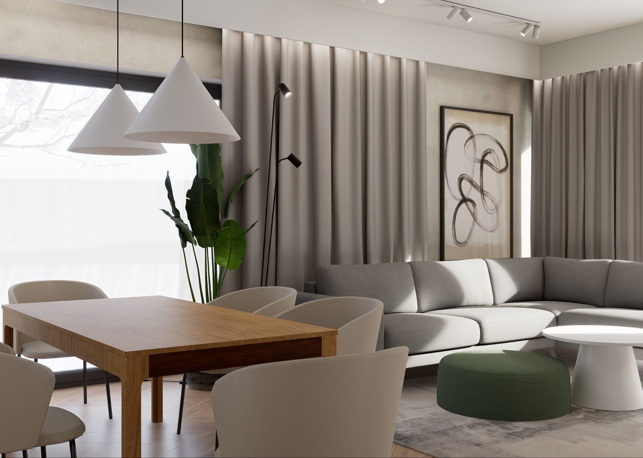 Jasne wnętrze: drewniany stół, krzesła w odcieniach beżu, szara sofa narożna i abstrakcyjny obraz. Minimalistyczny design z lampami stożkowymi i rośliną doniczkową.
