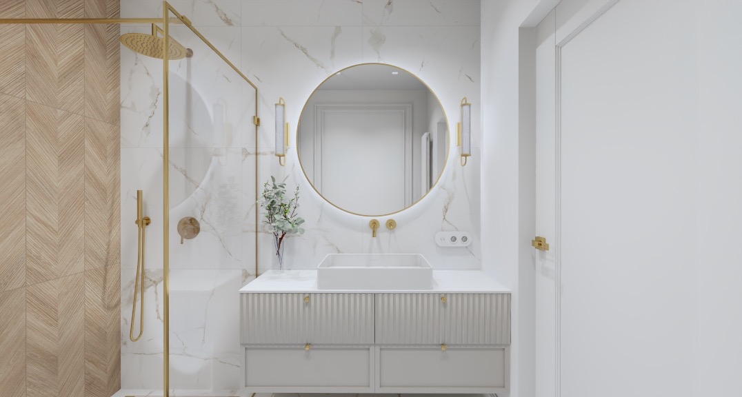 Elegancka łazienka z prysznicem typu walk-in, umywalką nablatową i okrągłym lustrem z podświetleniem LED oraz złotą armaturą.