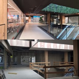 DALF - Dzielone ujęcie: ukończona galeria handlowa z eskalatorem i surowy stan wykończeniowy wnętrza z pracownikiem na drabinie, prezentujące etapy prac.