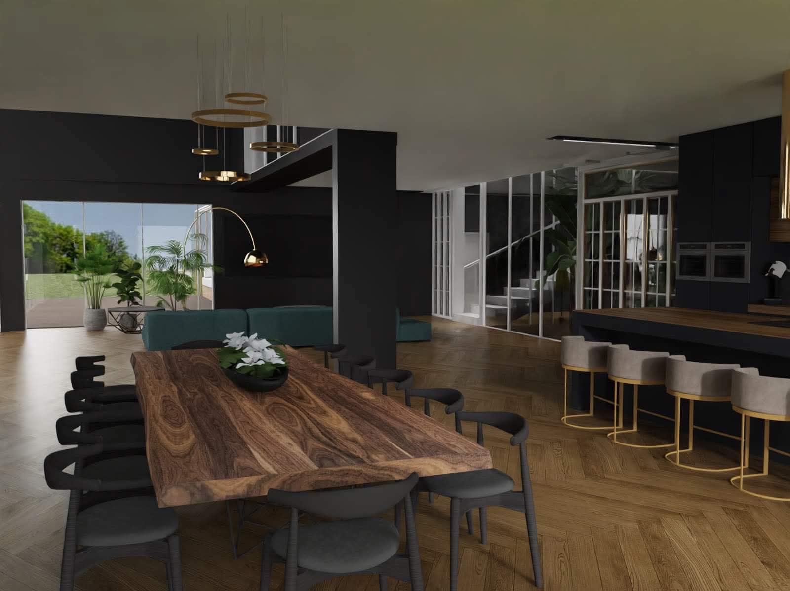 Wnętrze domu z dużym drewnianym stołem, kwiatami, czarnymi ścianami i schodami w tle. Widok na salon i kuchnię, nowoczesny design.