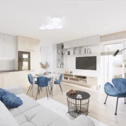 Jasne, przestronne wnętrze z aneksem kuchennym, okrągłym stołem z aksamitnymi krzesłami w odcieniach niebieskiego, szarą sofą z poduszkami i stolikiem kawowym z przekąskami, oświetlone nowoczesną...