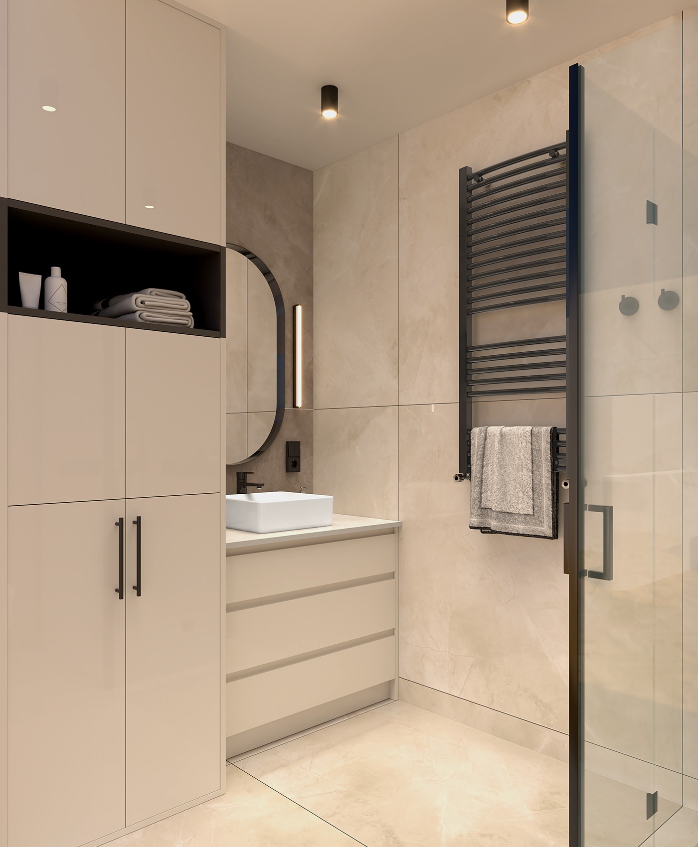 Nowoczesna łazienka z beżowymi płytkami, umywalką nablatową, owalnym lustrem z podświetleniem LED, grzejnikiem drabinkowym z ręcznikiem i kabiną prysznicową ze szklanymi drzwiami.