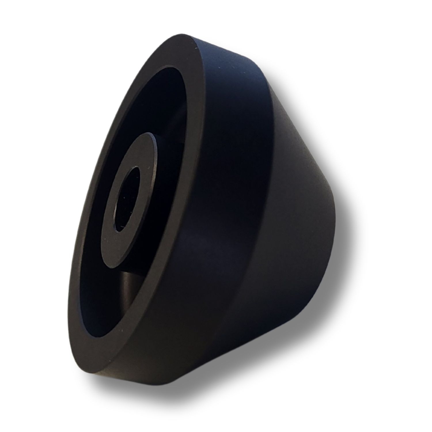 Element toczony CNC z aluminium i anodowany na czarno dla motorsportu.