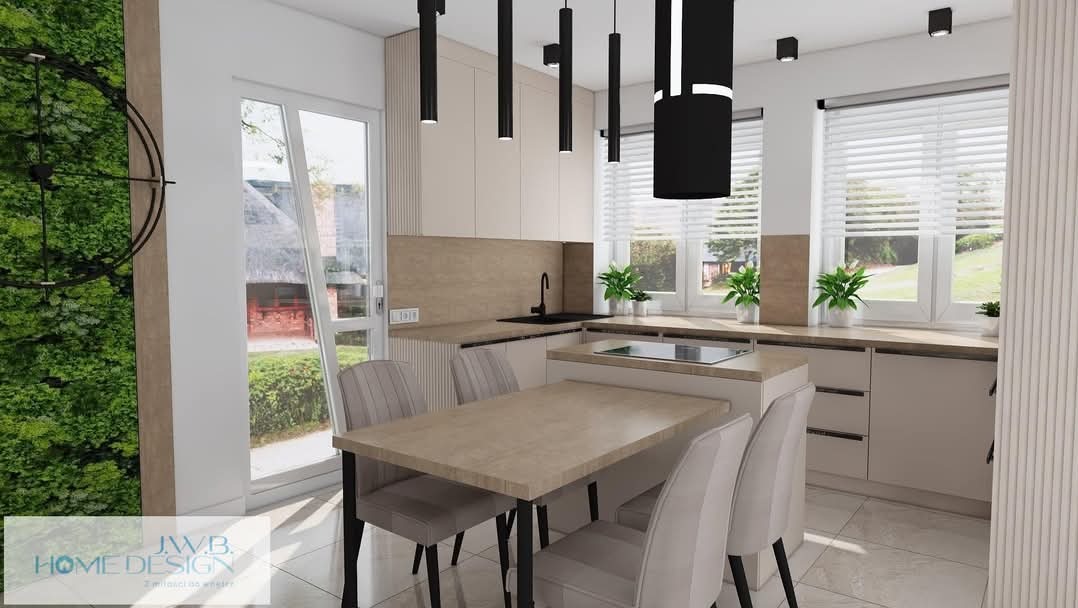 Jasna kuchnia z wyspą i zieloną ścianą w Trzebini. Minimalistyczne lampy, duże okna z żaluzjami i stół z krzesłami tworzą nowoczesną aranżację.