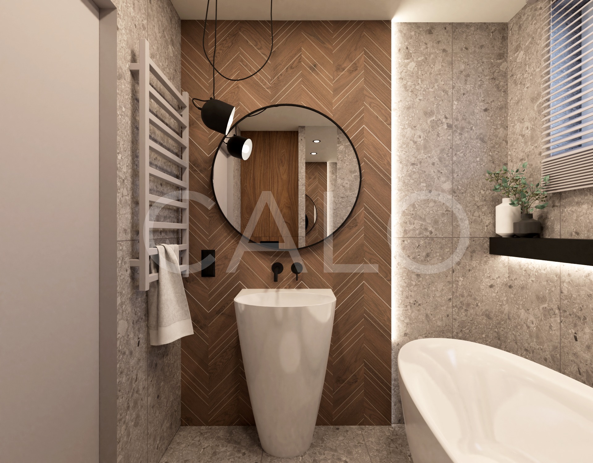 Nowoczesna łazienka z umywalką wolnostojącą, okrągłym lustrem i drewnianą ścianą w jodełkę. Minimalistyczne oświetlenie i jasne płytki tworzą spójną całość.