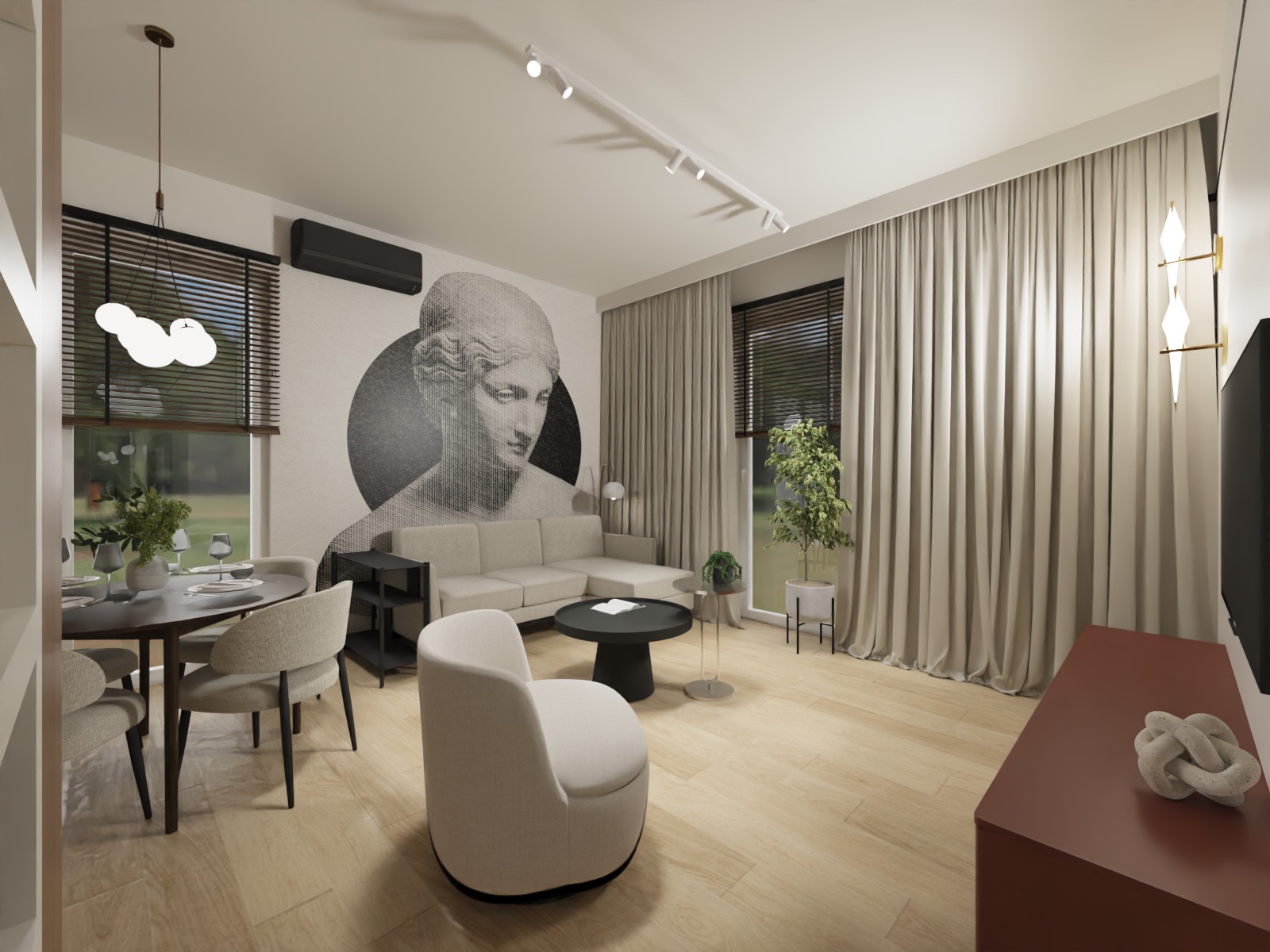 Jasne wnętrze salonu z jadalnią: sofa narożna, okrągły stół, krzesła tapicerowane, fotel, grafika na ścianie, drewniana podłoga i zasłony w oknach.