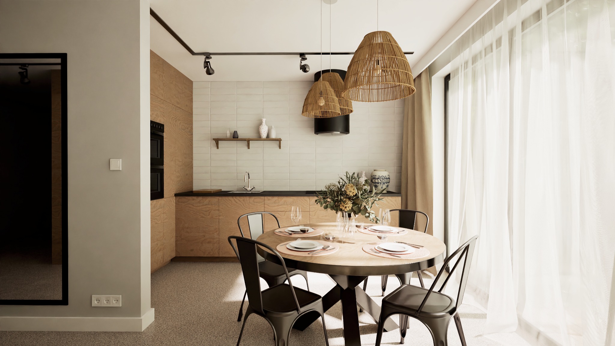 Jasna kuchnia z drewnianymi szafkami, okrągłym stołem jadalnym, czarnymi krzesłami i trzema wiklinowymi lampami wiszącymi. Minimalistyczny wystrój wnętrza.