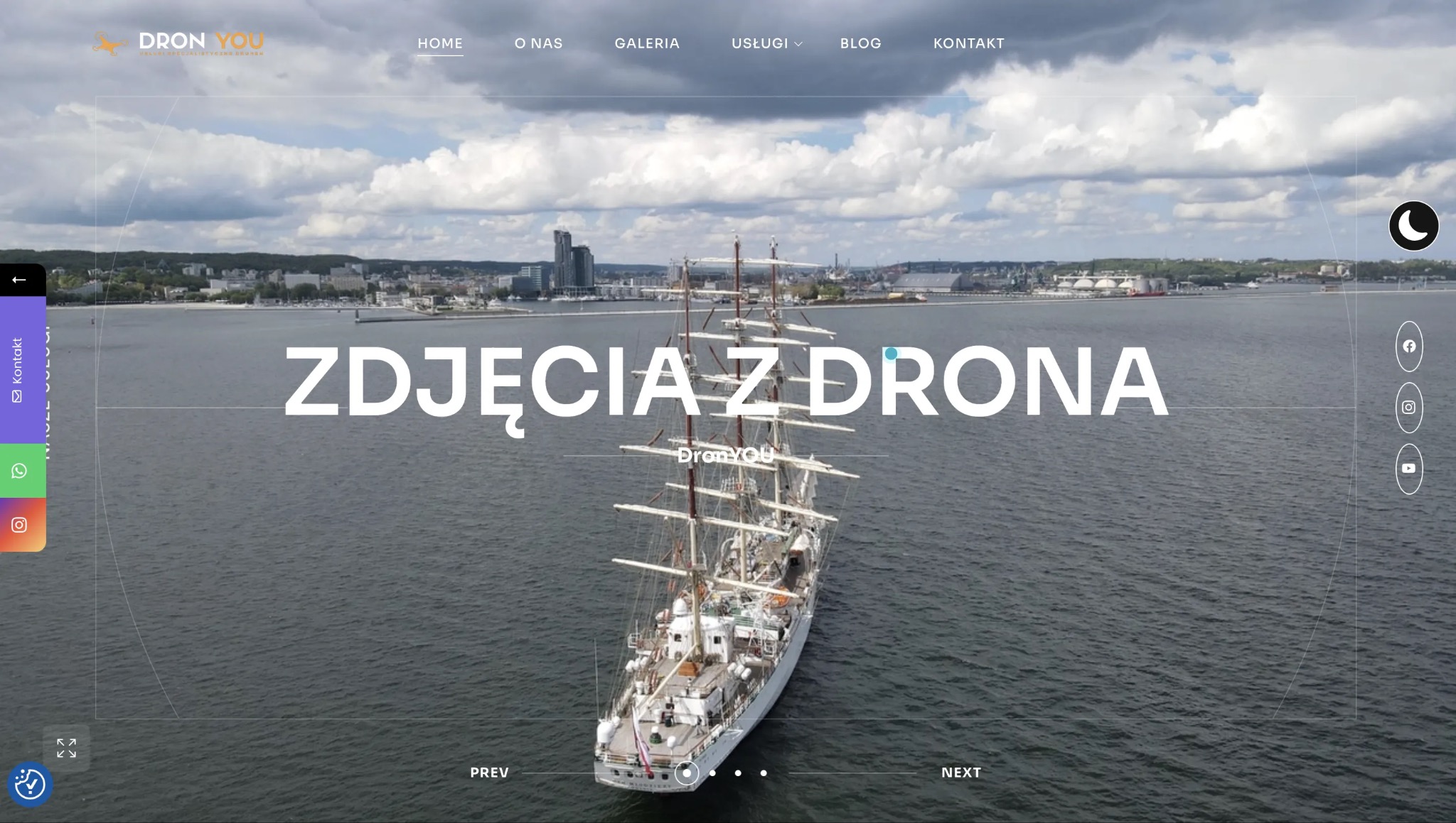 Strona internetowa z widokiem z drona na żaglowiec na tle miasta. Logo 'Dron You' i nawigacja w górnej części strony.
