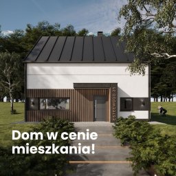 ESTEEWOOD S.C. SYLWIA PISZCZEK, ADAM PISZCZEK - Nowoczesny dom z ciemnym dachem i drewnianą fasadą. Widoczne numer domu 'ESTEEWOOD 25' i osoby w oddali. Napis: 'Dom w cenie mieszkania!'.