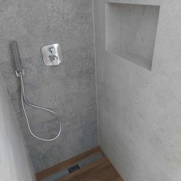 Kacper Czop - Nowoczesna kabina prysznicowa z szarą, teksturowaną ścianą i drewnopodobną podłogą w Kwidzynie. Wnęka w ścianie i minimalistyczna armatura.