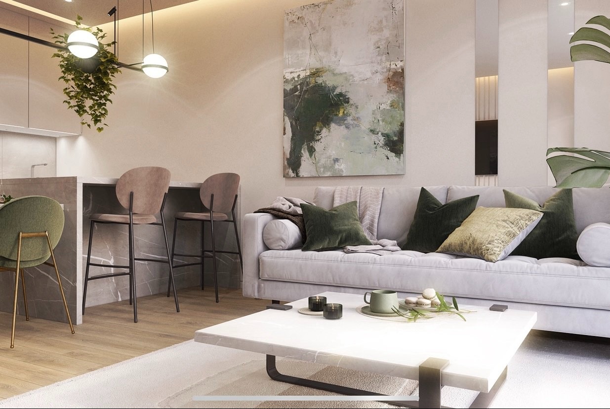 Nowoczesny salon z marmurowym stolikiem kawowym, szarą sofą z poduszkami i wysokimi krzesłami barowymi pod wiszącą lampą z roślinami.