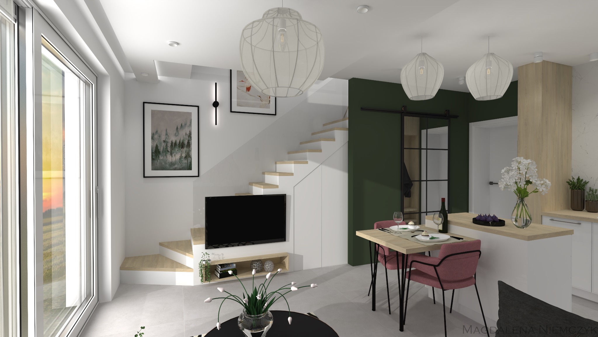 Wnętrze salonu z aneksem kuchennym: schody z TV, stół dla dwojga z zastawą, nowoczesne lampy wiszące, zielona ściana z przesuwnymi drzwiami. Jasne, minimalistyczne wykończenie.