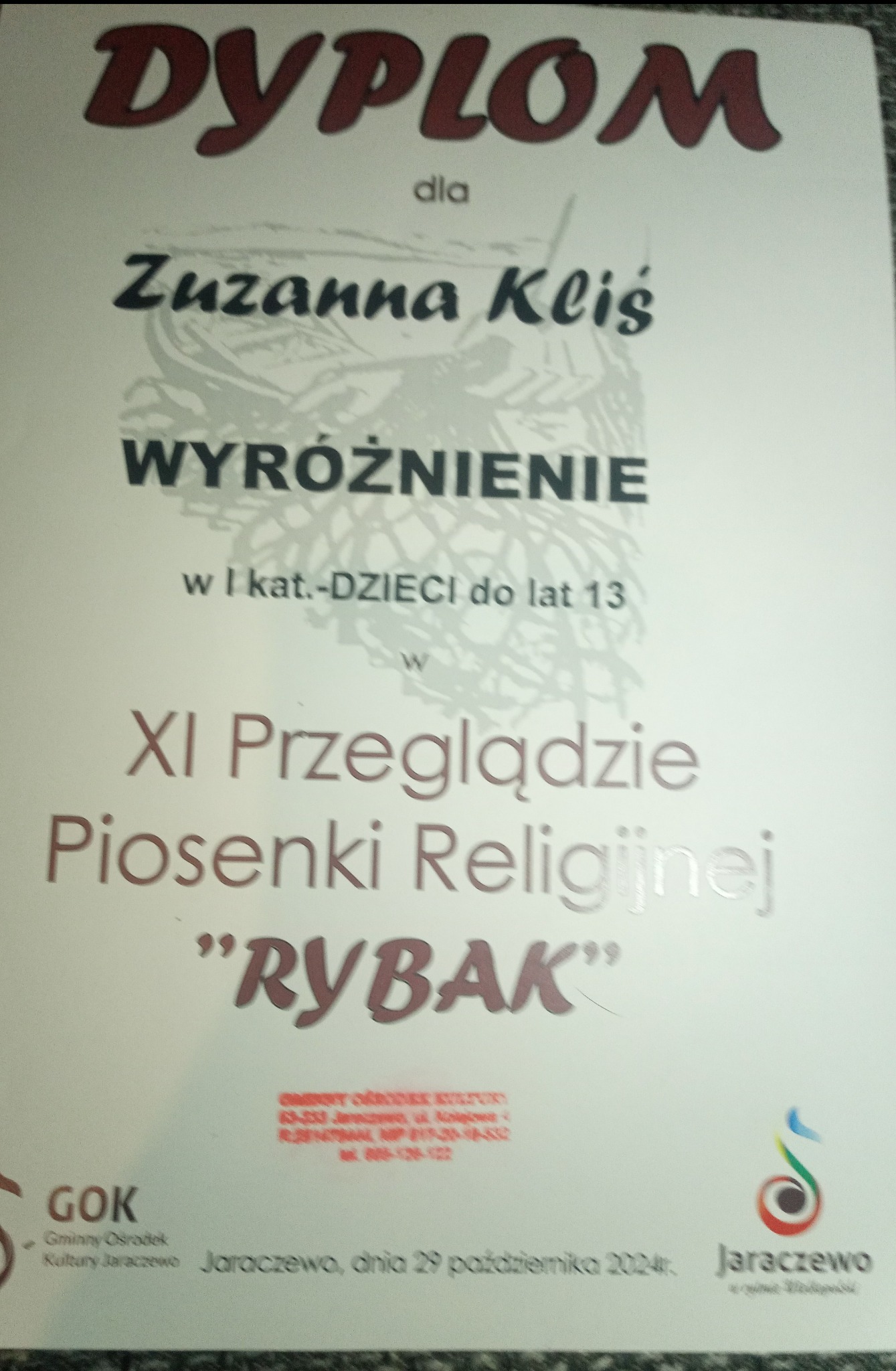 Dyplom dla Zuzanny Kliś za wyróżnienie w XI Przeglądzie Piosenki Religijnej 'RYBAK' w kategorii dzieci do lat 13, Jaraczewo, 29 października 2024.