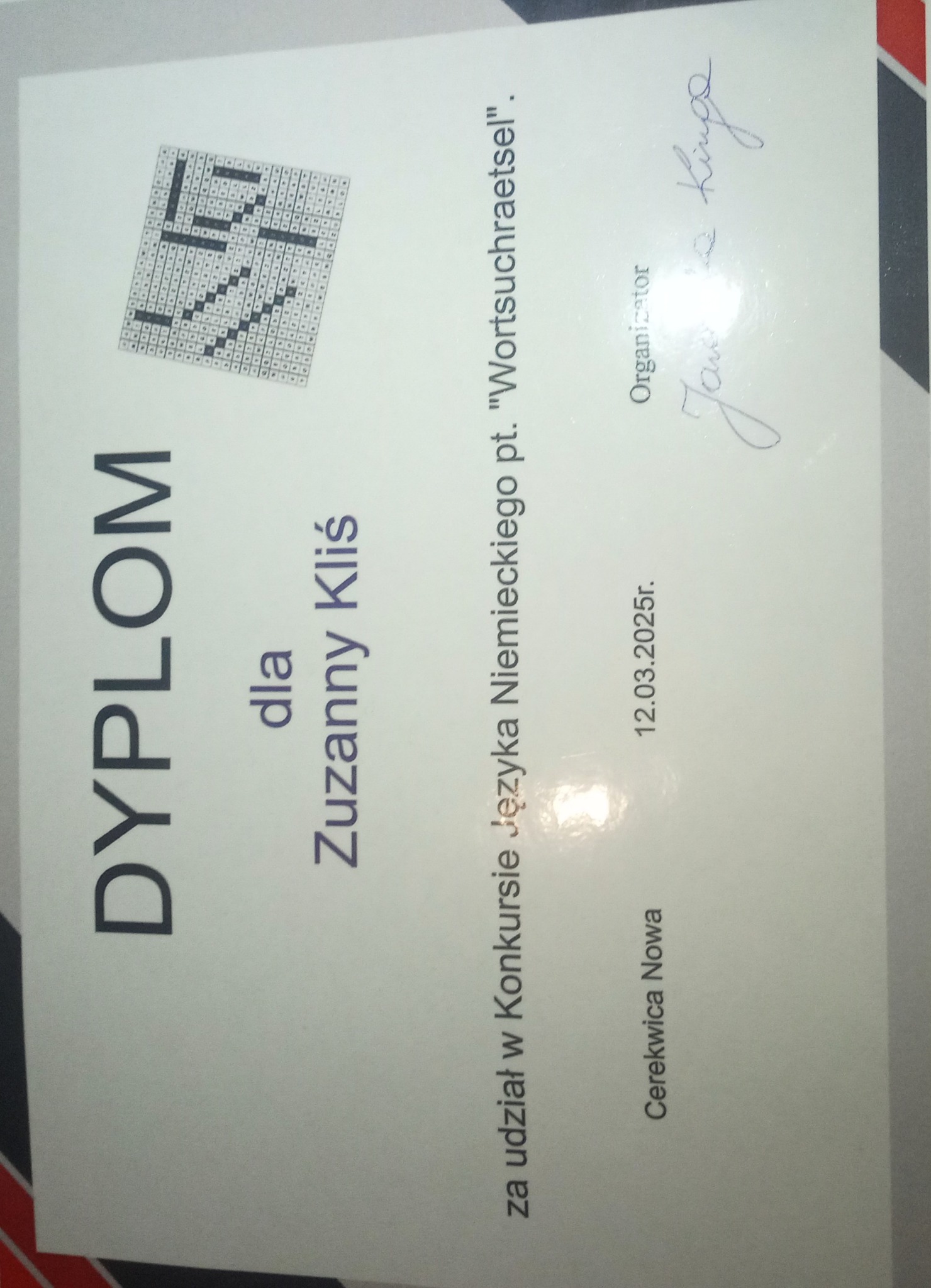 Dyplom dla Zuzanny Kliś za udział w Konkursie Języka Niemieckiego 'Wortsuchraetsel', Cerekwica Nowa, 12.03.2025r. Podpis organizatora.