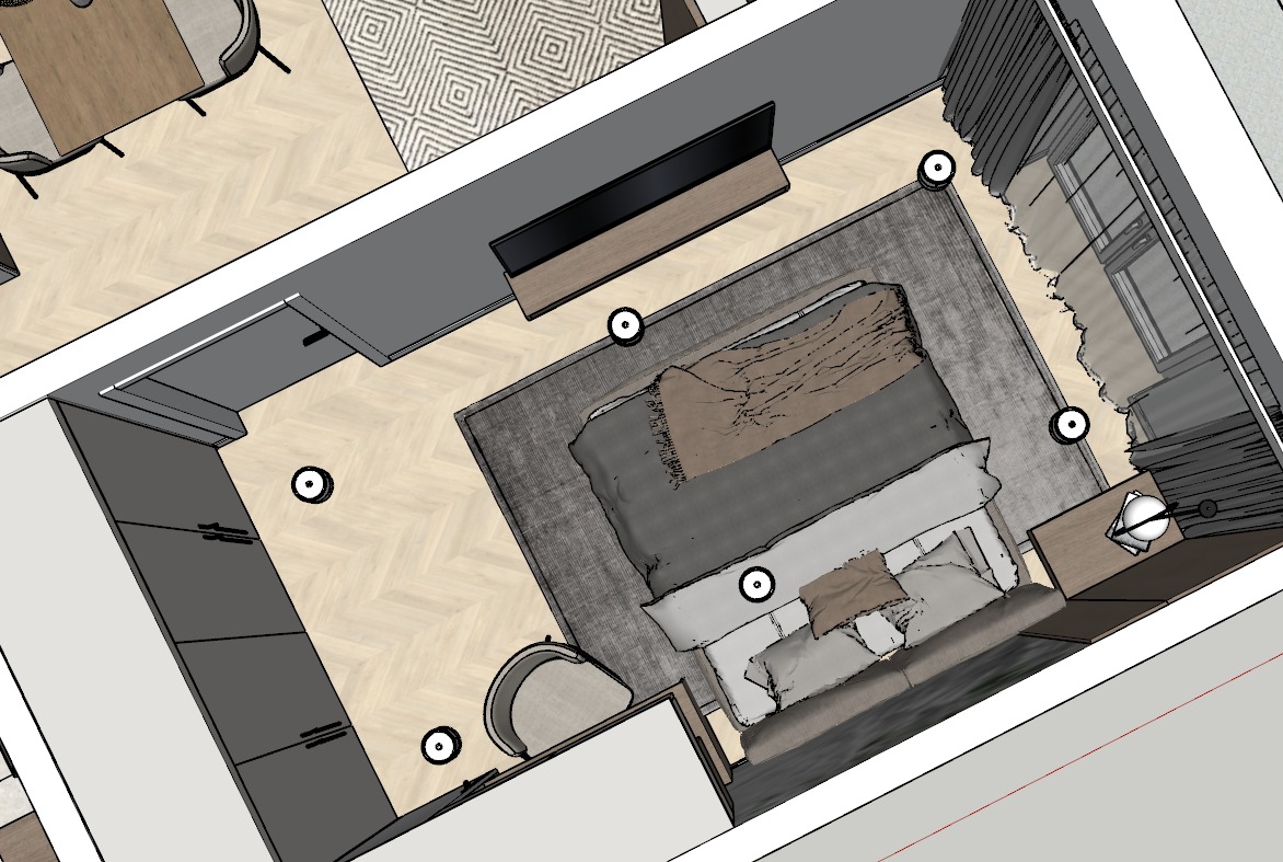 Rzut z góry na wizualizację 3D sypialni z łóżkiem, szafką nocną z lampą, telewizorem i szafą w zabudowie. Parkiet ułożony w jodełkę francuską.