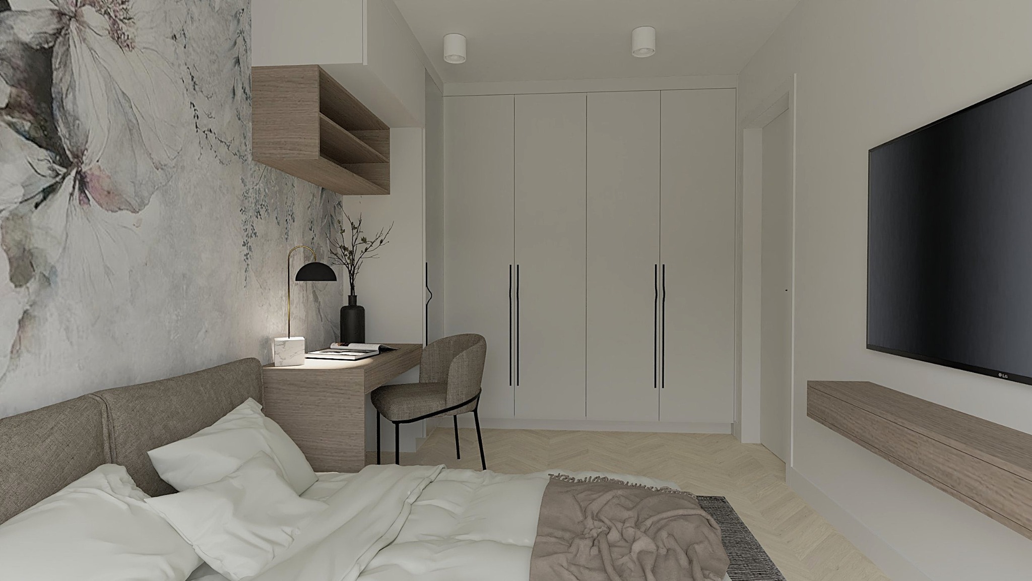 Nowoczesna sypialnia z tapetą w kwiaty, biurkiem z lampką i telewizorem. Jasne kolory, minimalistyczny styl, zabudowa szaf. Przytulne i funkcjonalne wnętrze.