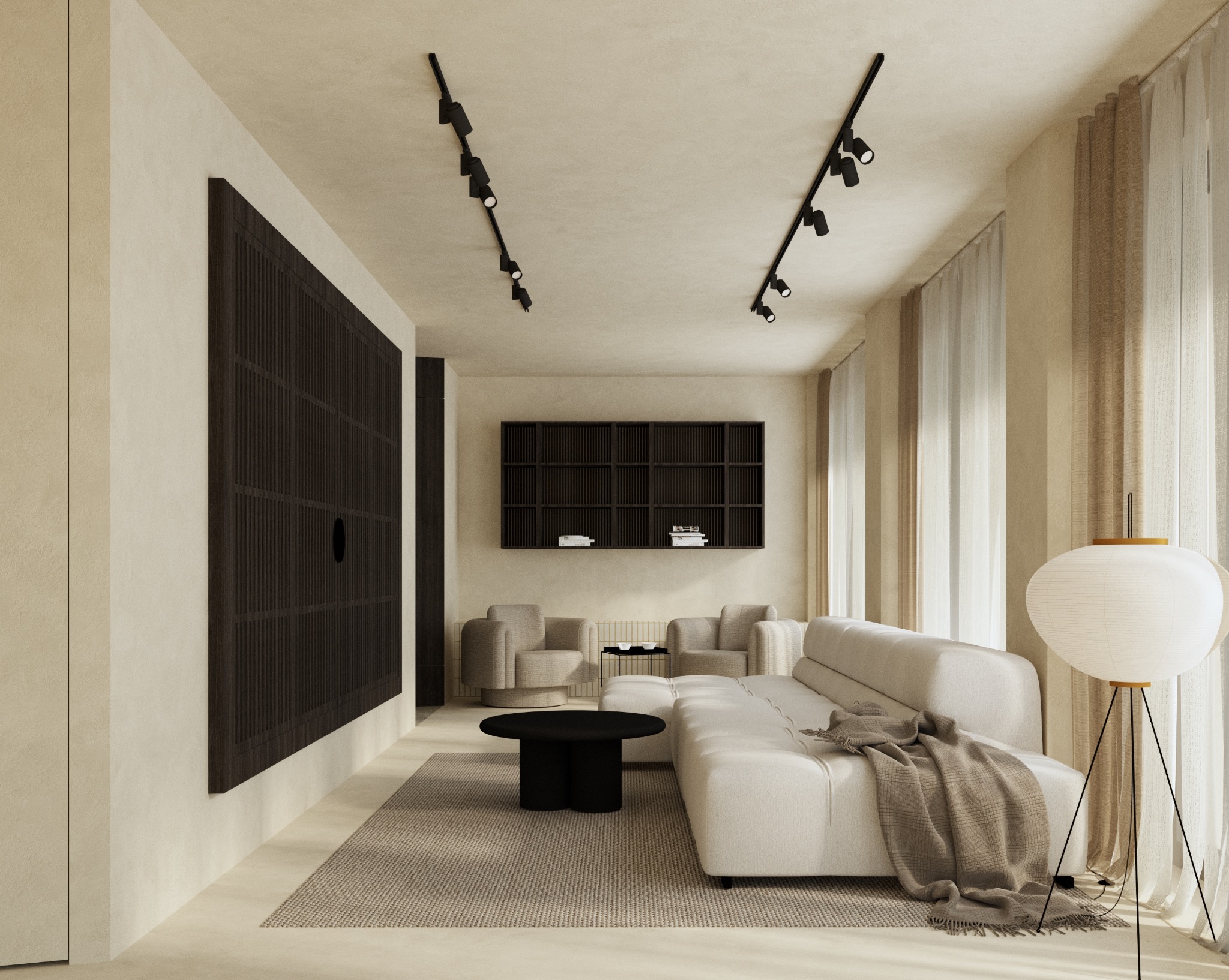Eleganckie wnętrze salonu z beżowymi ścianami, ciemnymi akcentami meblowymi i punktowym oświetleniem, tworzące spójną, nowoczesną przestrzeń. Widoczny fragment sofy.