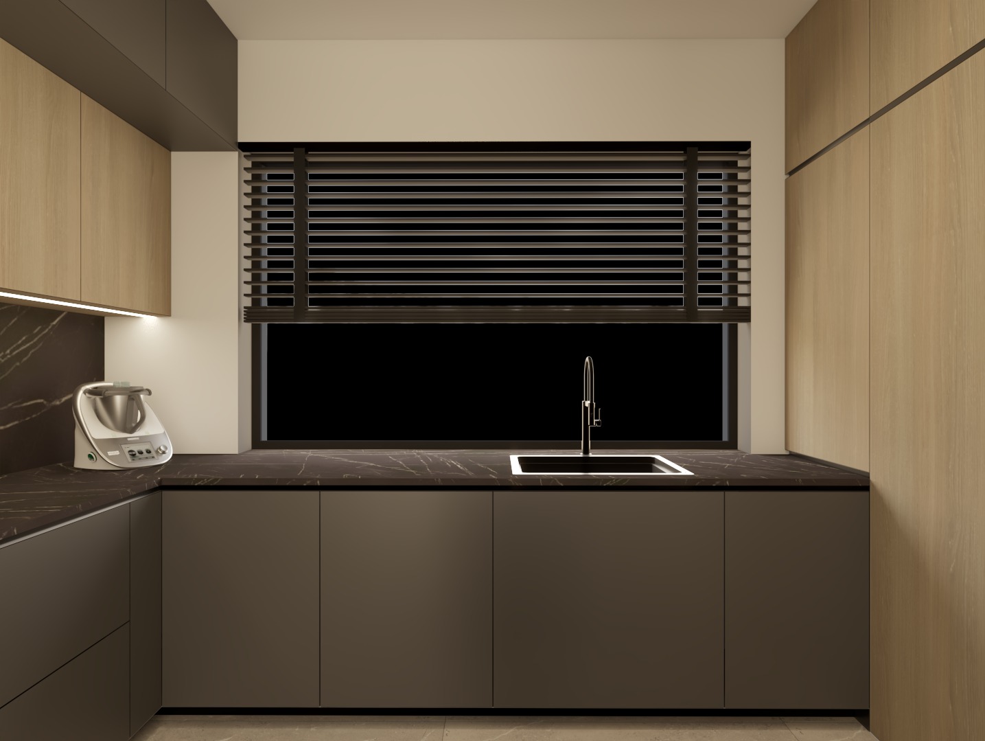 Nowoczesna kuchnia w Panieńszczyźnie z ciemnym blatem, minimalistycznymi szafkami i drewnianymi akcentami. W oknie żaluzje, na blacie robot kuchenny.