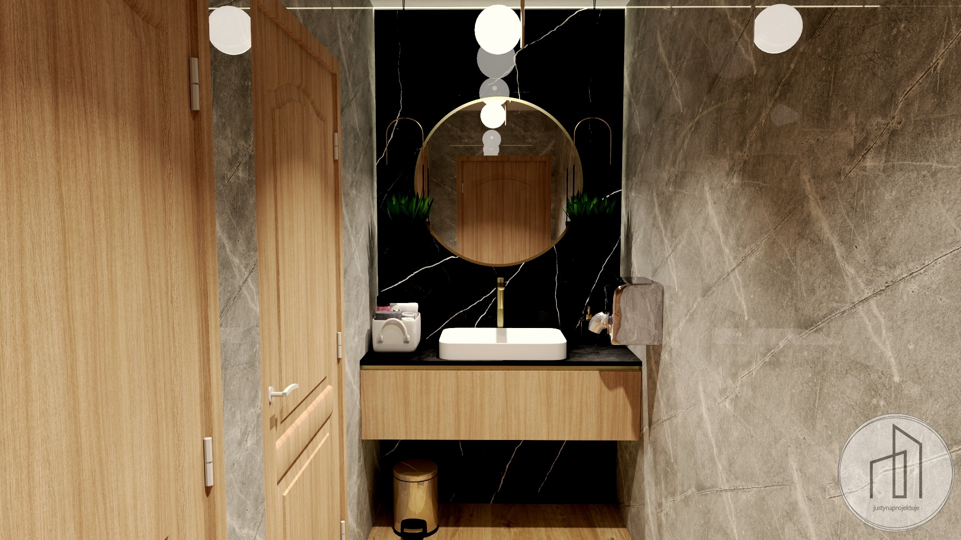 Elegancka łazienka z umywalką nablatową, okrągłym lustrem w złotej ramie i czarnym marmurem na ścianie. Drewniane drzwi i szafka pod umywalką dodają ciepła.