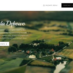 SELEA SPÓŁKA Z OGRANICZONĄ ODPOWIEDZIALNOŚCIĄ - Strona www ośrodka eventowego z widokiem na krajobraz Warmii i Mazur. W tle pola i lasy, na pierwszym planie nazwa ośrodka i przycisk 'Dowiedz się więcej'.