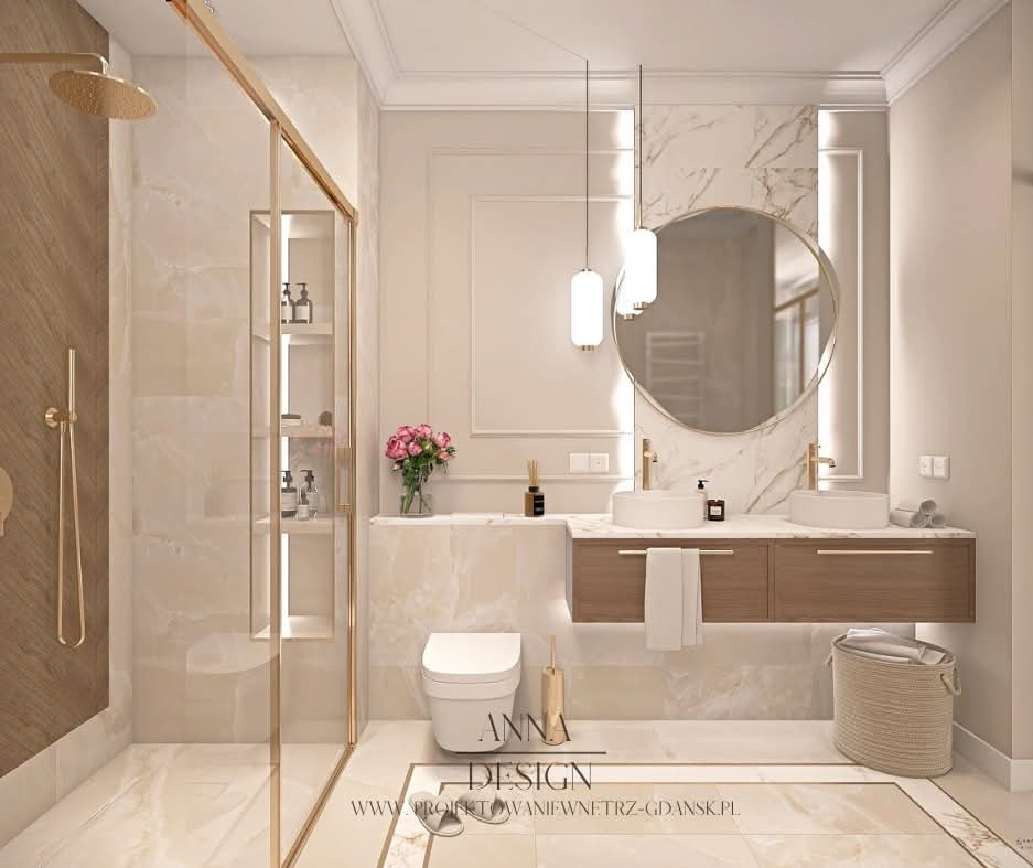 Elegancka łazienka z kabiną prysznicową typu walk-in, okrągłym lustrem podświetlonym LED i dwiema umywalkami nablatowymi. Złote akcenty armatury i oświetlenia.