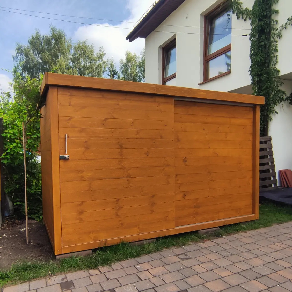 Domek ogrodowy w nowoczesnym minimalistycznym stylu. Dopasujemy jego rozmiar dla Ciebie.