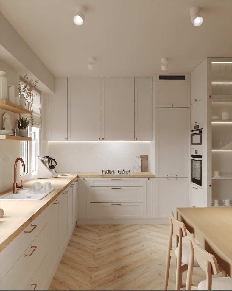 Jasna kuchnia w stylu skandynawskim: białe szafki z drewnianymi blatami, parkiet w jodełkę, miedziana armatura i oświetlenie punktowe. Minimalistyczny design.