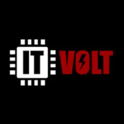 Logo IT Volt: biały układ scalony z 'IT' i czerwony napis 'VOLT' z błyskawicą na czarnym tle. Wyrazisty kontrast, nowoczesny design.