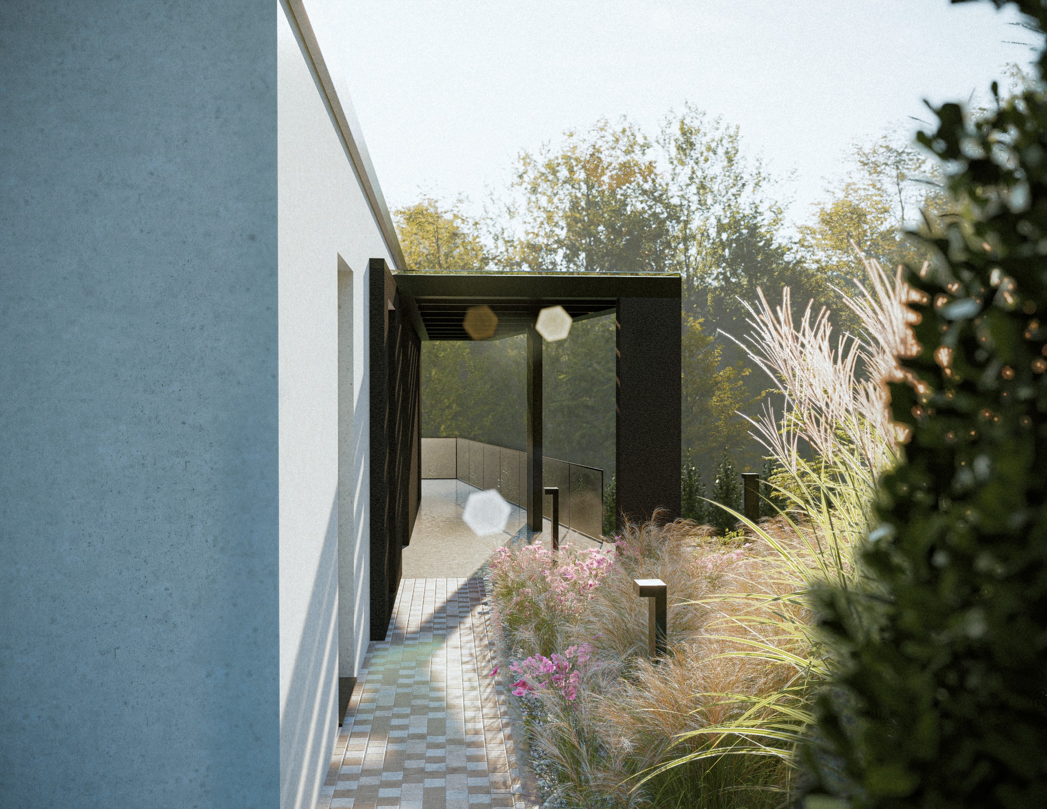 Nowoczesna pergola z czarną konstrukcją i szklanymi barierkami, otoczona kwitnącymi rabatami i ozdobnymi trawami w słonecznym ogrodzie.