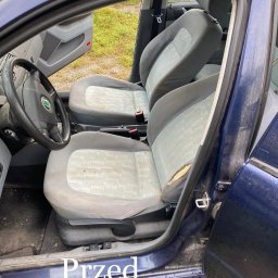 NoVel Clean - Z bliska wnętrze auta z widocznymi, zabrudzonymi fotelami i otwartymi drzwiami. Na dole kadru widoczny napis 'Przed'.