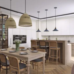 Elegancka, jasna kuchnia z wyspą i stołem jadalnym. Wnętrze doświetlają wiszące lampy w stylu boho. Widoczny parkiet w jodełkę i szklana witryna.