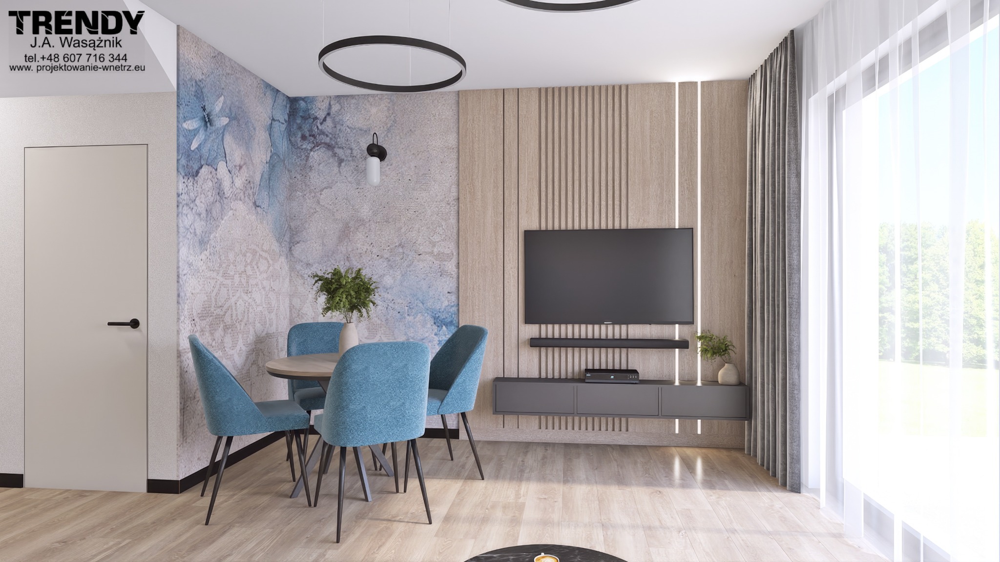 Nowoczesne wnętrze: okrągły stół z błękitnymi krzesłami, ściana z motywem akwareli, telewizor na tle drewnianych paneli z podświetleniem. Minimalistyczny design.