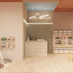 Bjorn Studio Karolina Strzelczyk - Wnętrze pokoju dziecięcego z tipi, regałami na książki i drewnianymi meblami. Sufit z lampami w kształcie chmur i elementami dekoracyjnymi w ciepłych barwach.