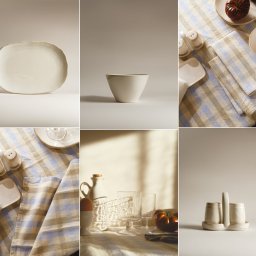 Małgorzata Fu - Kolaż z neutralnymi naczyniami: talerz, miska, solniczka, pieprzniczka, szklanki i pomidor na tekstylnej serwetce w paski, w ciepłym oświetleniu.