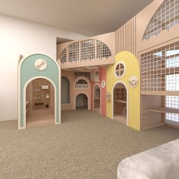 Mistre Group sp. z o.o. - Kreatywna aranżacja pokoju zabaw dla dzieci z drewnianymi konstrukcjami w pastelowych kolorach, siatkami zabezpieczającymi i elementami edukacyjnymi.