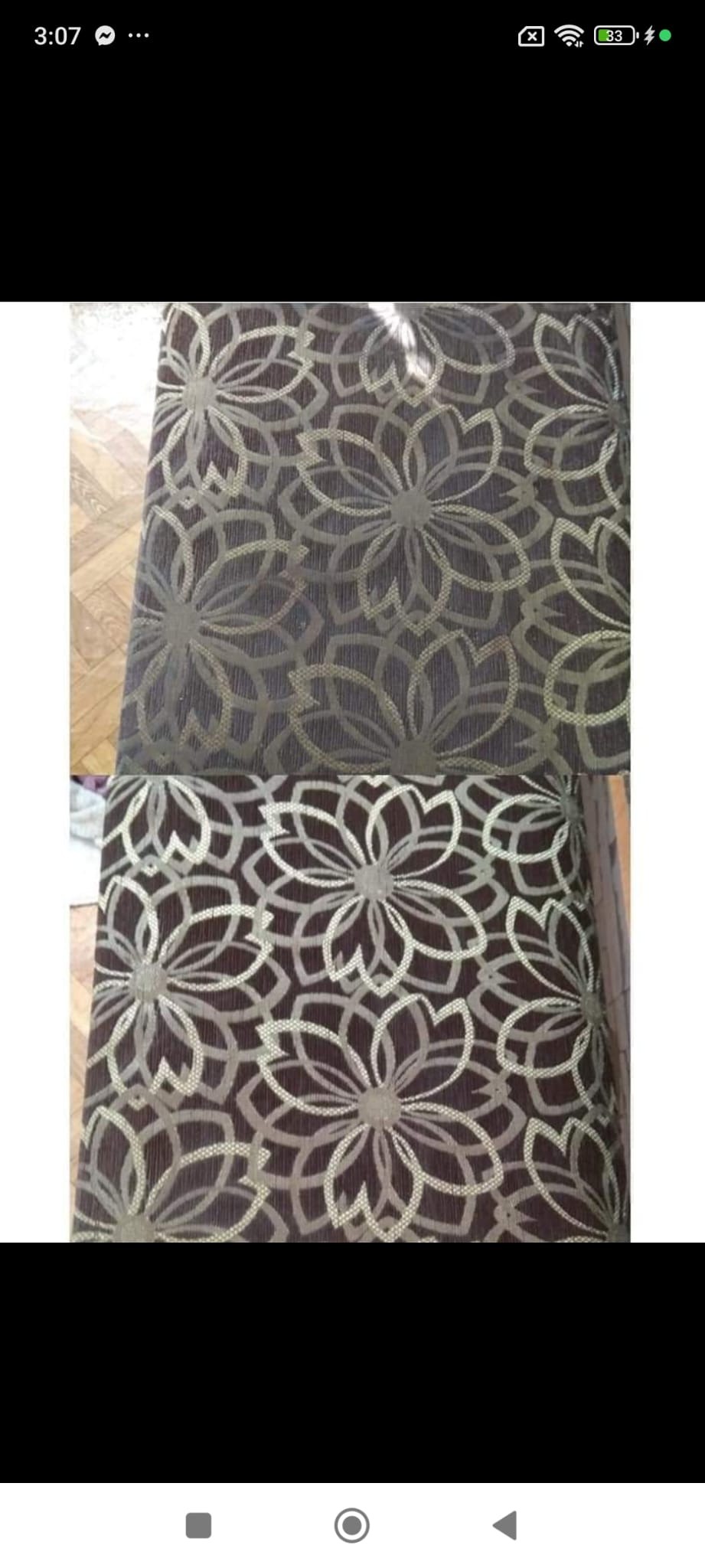 Tapicerka krzesła lub sofy z brązowym tłem i wzorem kwiatowym. Wzór jest powtarzalny, a kwiaty mają jasne obrysy.