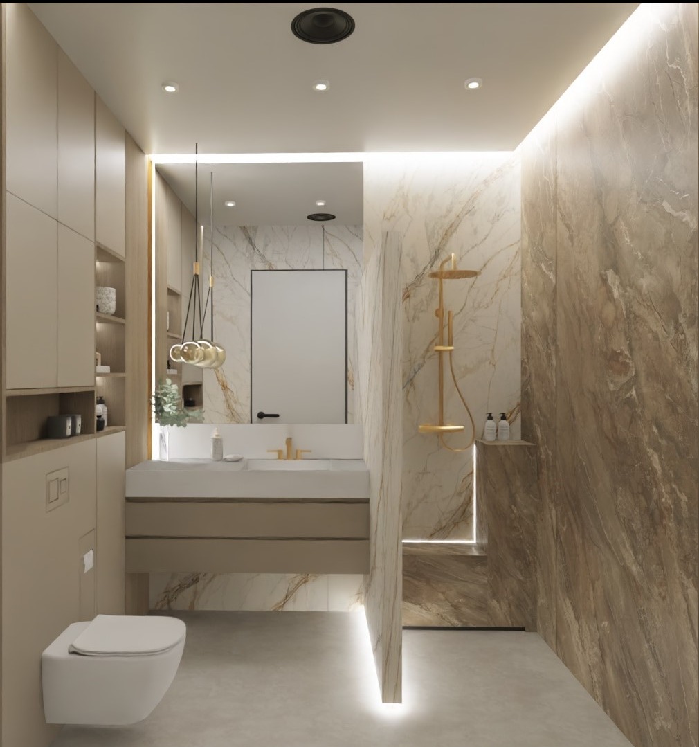 Elegancka łazienka z marmurowymi ścianami, złotą armaturą i designerską lampą wiszącą. Umywalka z szafką i podświetleniem LED. Nowoczesna toaleta podwieszana.