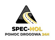 Logo SPEC-HOL Pomoc Drogowa 24H z drogą w trójkącie, w Jastrowiu. Czarno-żółta grafika, czcionka bezszeryfowa. Całodobowa pomoc na drodze.