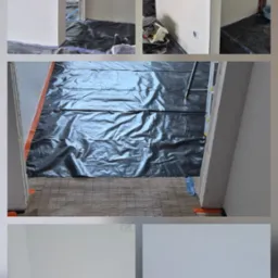 Białe ściany po malowaniu w Łowiczu, zabezpieczona podłoga, widoczne gniazdka elektryczne i włączniki. Detal wykończenia wnętrza po remoncie.