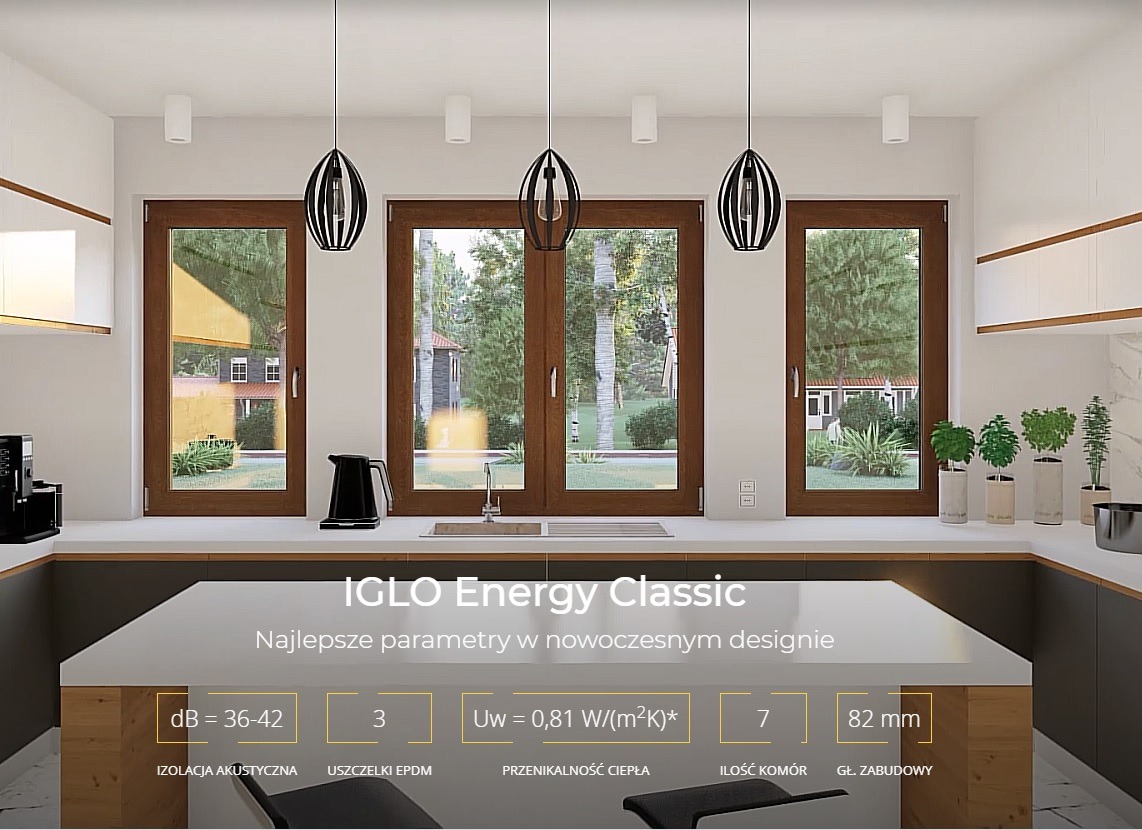 Nowoczesna kuchnia z drewnianymi oknami: trzy okna z widokiem na zieleń, designerskie lampy wiszące. Prezentacja parametrów okiennych IGLO Energy Classic.