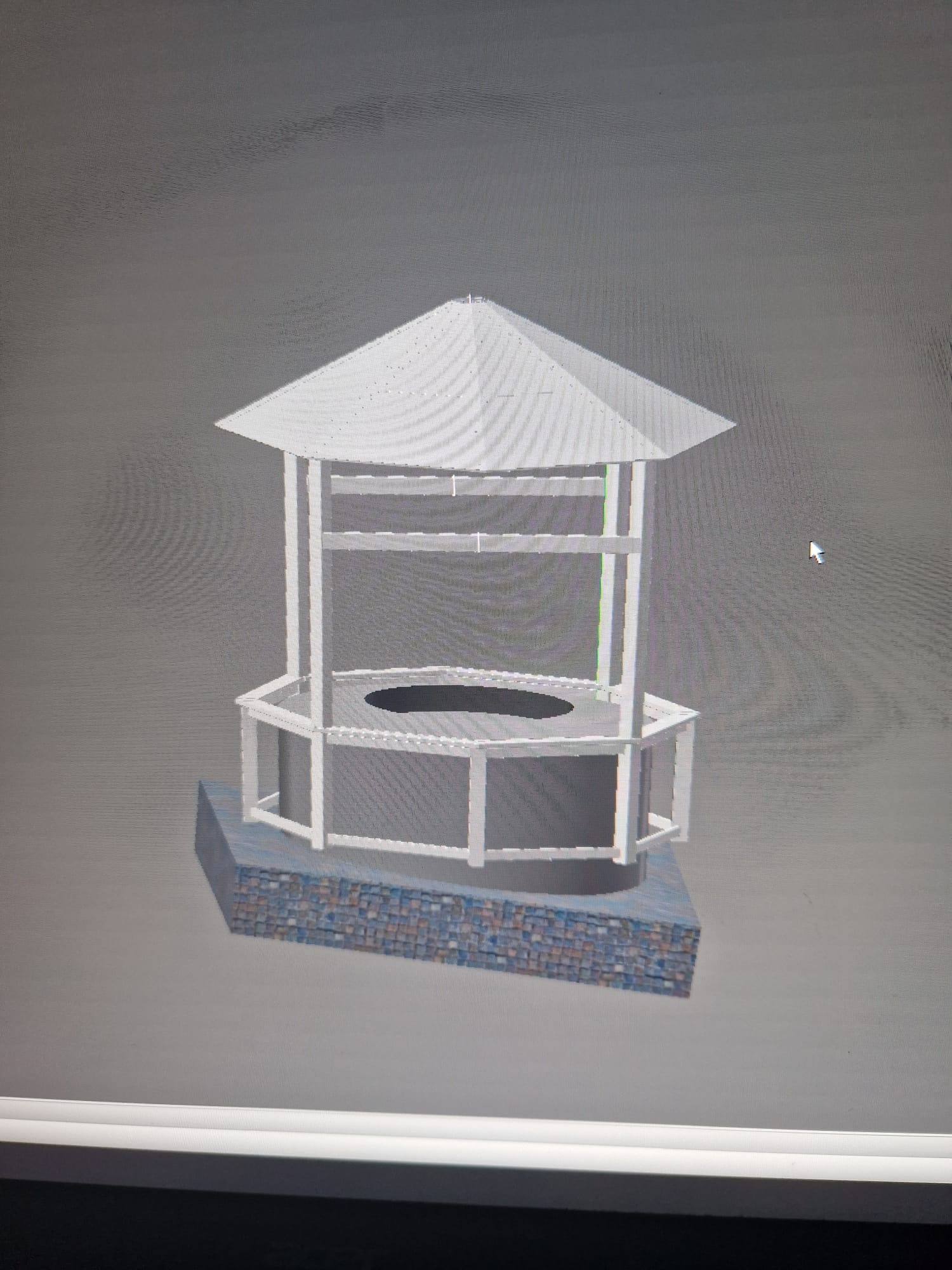 Wizualizacja 3D białej, ośmiokątnej pergoli z dachem, umieszczonej na podwyższeniu z imitacji kamienia, z widocznym kursorem myszy w tle.
