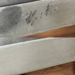 Czyste Meble Bydgoszcz - Fragment tapicerki: widoczna plama przed (góra) i po czyszczeniu (dół). Jasnoszary materiał z delikatną fakturą i przeszyciem. Efekt czyszczenia.