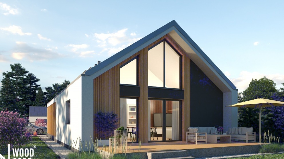 Nowoczesny dom modułowy z drewnianą elewacją i dużymi oknami, taras z meblami ogrodowymi i parasolem, samochód zaparkowany obok domu.